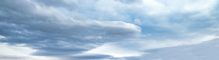 Clouds in the overcast sky view. Climate, environment and weather concept sky background.