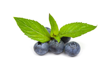 Fresh fruits. Healthy food. Mixed fruit, strawberries and blueberries, peaches. Studio photography of various fruits on an old wooden table.