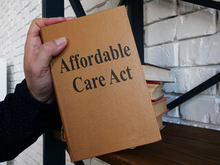 Affordable Care Act ACA is shown on the conceptual business photo
