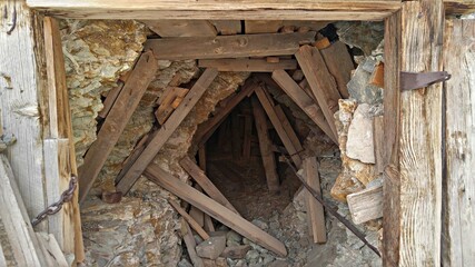 Unique Angled Braces Of The Old Lost Burro Mine Shaft Entrance At Death Valley National Park, California.