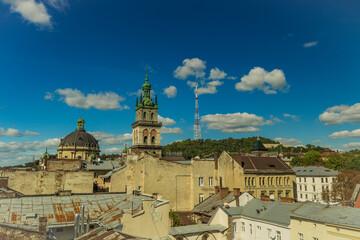 Lviv old city roof top landmark view Eastern European heritage touristic site in Ukraine summer clear weather day time medieval urban
