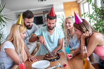 Friends making big party at home.