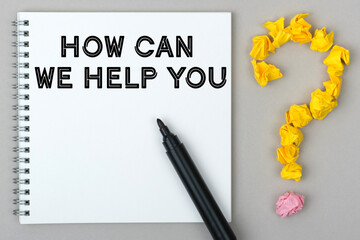 Hand with marker writing: How Can We Help You.