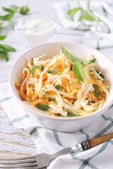Coleslaw salad with carrots, mint and Greek yogurty sauce