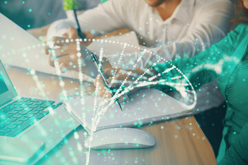Double exposure of DNA theme drawing over people taking notes background. Concept of medical...
