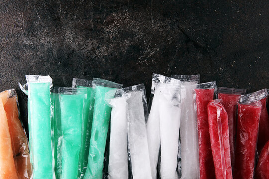 Colorful frozen fruit bar ice pops. Frozen Popsicles