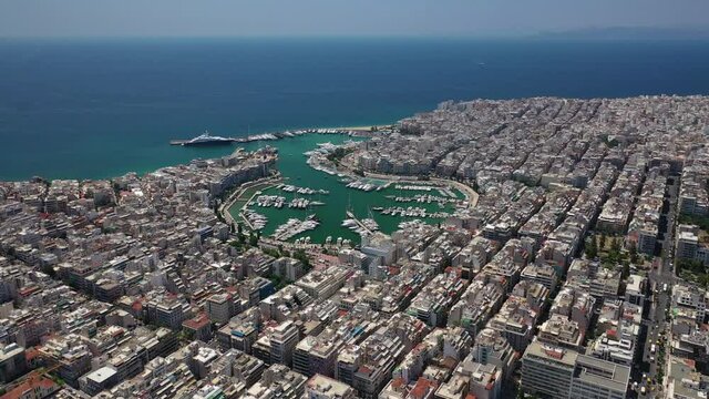 Aerial drone video of famous round port of Zea or Passalimani in the heart of Piraeus, Attica, Greece