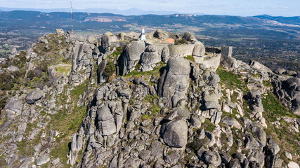 Aerial view of Monsanto castle in Portugal. Castle on the top of the rocky mountain