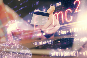 Double exposure of man hands holding a credit card and formula drawing. Education and E-commerce concept.