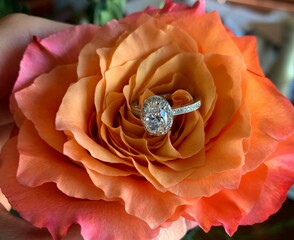 Stunning diamond engagement ring inside a flower