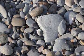 lots of different sized and coloured pebbles 