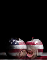 Still life of apples with American Flag design and angry mouths shouting symbolizing American Discord.