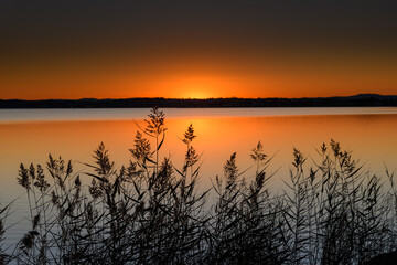 Sunset over the Lake with Clear Skies