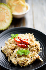 Northern Thai food (Tam Khanun), spicy pounded young jackfruit salad on plate