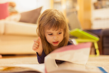 little girl reading a book