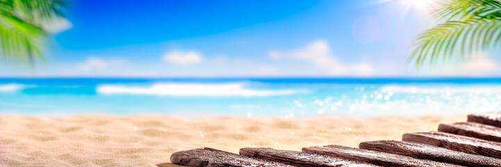 Wooden Boardwalk On Beach With Sunny Sky And Palm Leaves - Abstract Travel Background