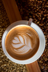 Delicious cup of capuchino coffee.