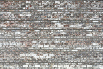 An abstract image of an old faded red brick wall. 