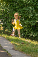 little girl in yellow dress