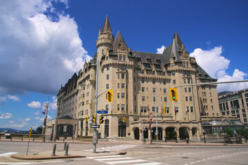 A large, classical looking building on a sunny day