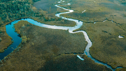 RIVER SHOT WITH ABANDONED BOAT
