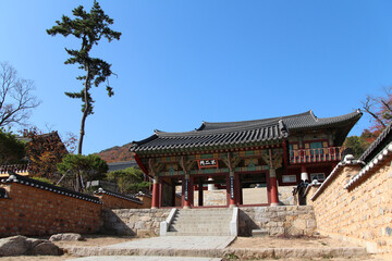 Korean traditional architecture entrance with Chinese words as Bu Er Men (Burimun Gate) at Beomeosa Temple in Busan, South Korea
