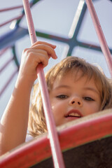 Girl in a park on equipment