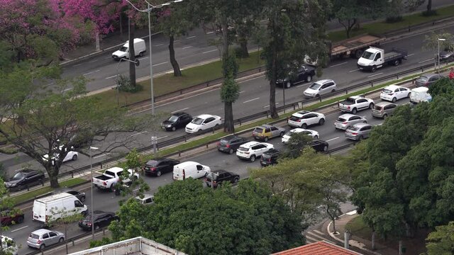 Big cities with traffic. Sao Paulo city, Bandeirantes avenue, Brazil.