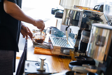 barista make coffee for customer