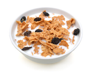 milk, bran and raisin cereal in a bowl , top view