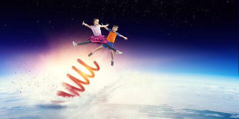 Obraz na płótnie Canvas Kids bouncing in the space