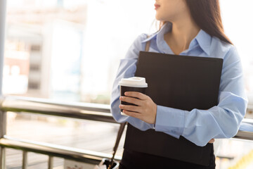 Fototapeta premium Beautiful Woman hold cup of coffee in the morning.