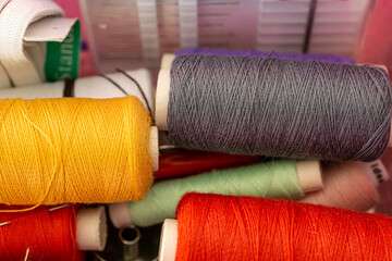 Collection of various colored tread used to sew clothes