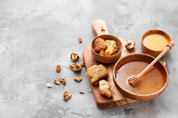 Fototapeta na wymiar Composition with sweet honey on table