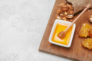 Composition with sweet honey on table