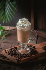 Iced latte coffee with whipped cream