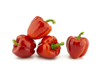 Red bell peppers on white background