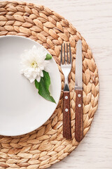 Obraz premium Simple table setting on white wooden background