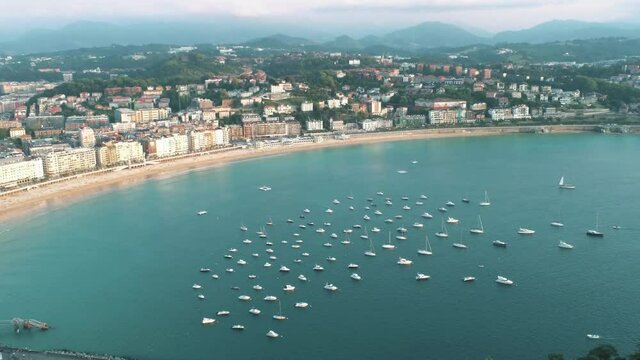 Aerial view in beach of La Concha in San Sebastian, coastal city  in Basque Country,Spain. Drone Video