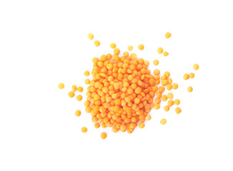 Red lentils on white background