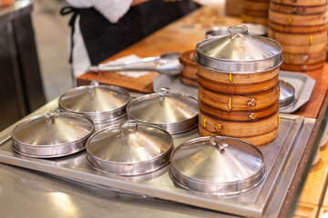 Special food steamers for Shanghai meat juicy dumplings, shot in a kitchen.