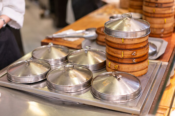 Special food steamers for Shanghai meat juicy dumplings, shot in a kitchen.