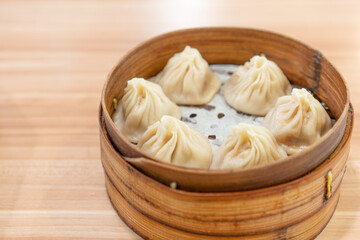 Shanghai Meat juicy dumplings, traditional snack in Shanghai, steamed dumplings with meat and soup inside.