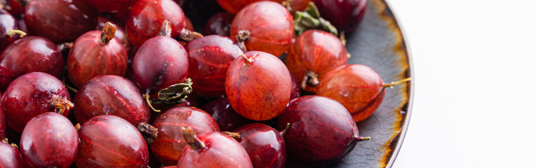 Close up shot of red gooseberry harvest. Healthy lifestyle and eating. Vegan food