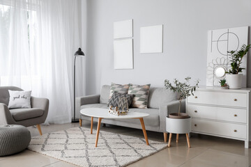 Interior of modern room with comfortable sofa