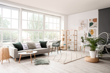 Fototapeta na wymiar Interior of modern room with comfortable sofa