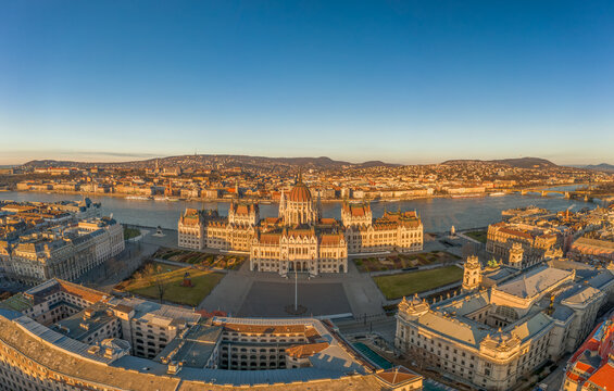 Aerial drone shot of east side facade of Hungarian Parliament Kossuth Square during Budapest sunrise