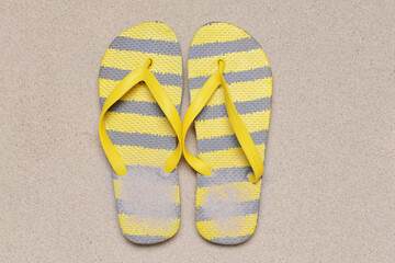 Stylish flip-flops on grey background