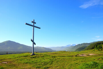 Poklonniy cross on the place of the Cossack outpost of the XVIII and XIX centuries to protect the state border of the Russian Empire. Mountain cross. Sayanogorsk. The Republic of Khakassia.