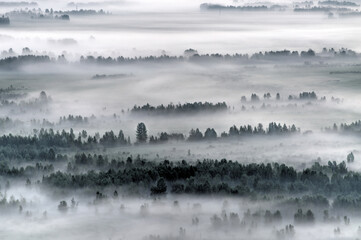 Mountain-steppe landscape in the fog. South Siberia. The Republic of Khakassia.